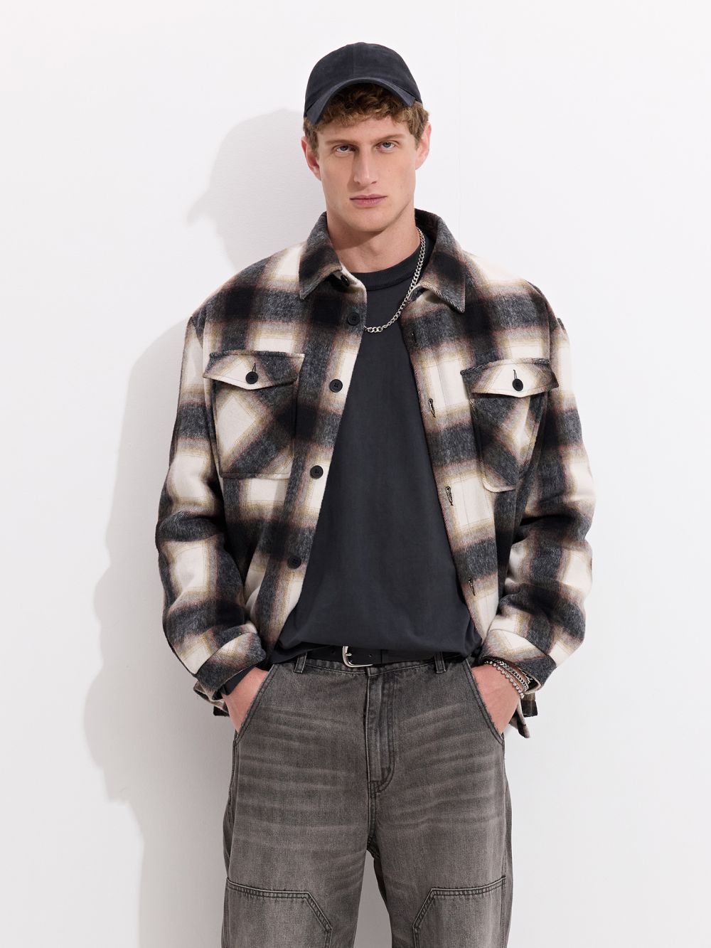 ז׳קט משבצות עם כיסים קדמיים