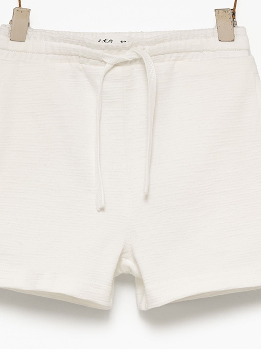 מכנסיים מבד טקסטורה