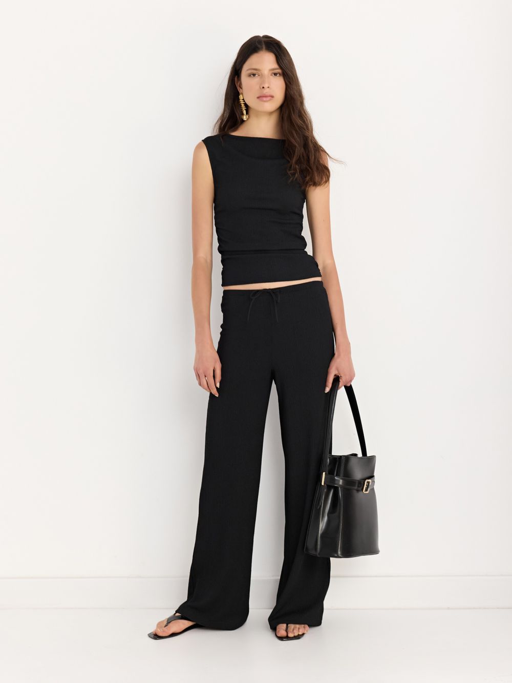 מכנסיים מבד טקסטורה