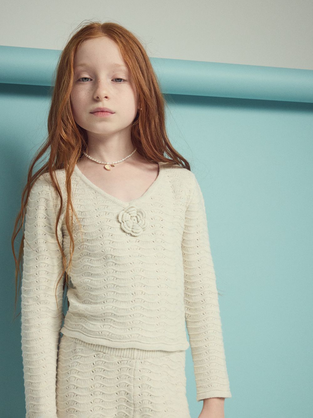 סריג ארוך עם פרח