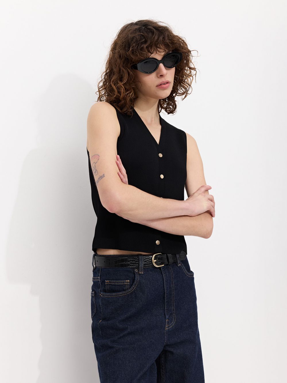 סריג ריב עם תיקתקים בצבע זהב