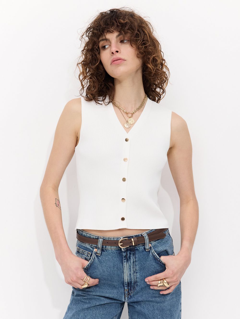 סריג ריב עם תיקתקים בצבע זהב