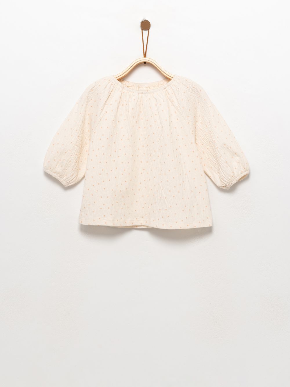 חולצה עם כיווצים