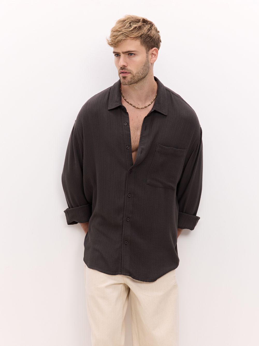 מכופתרת מבד רקום