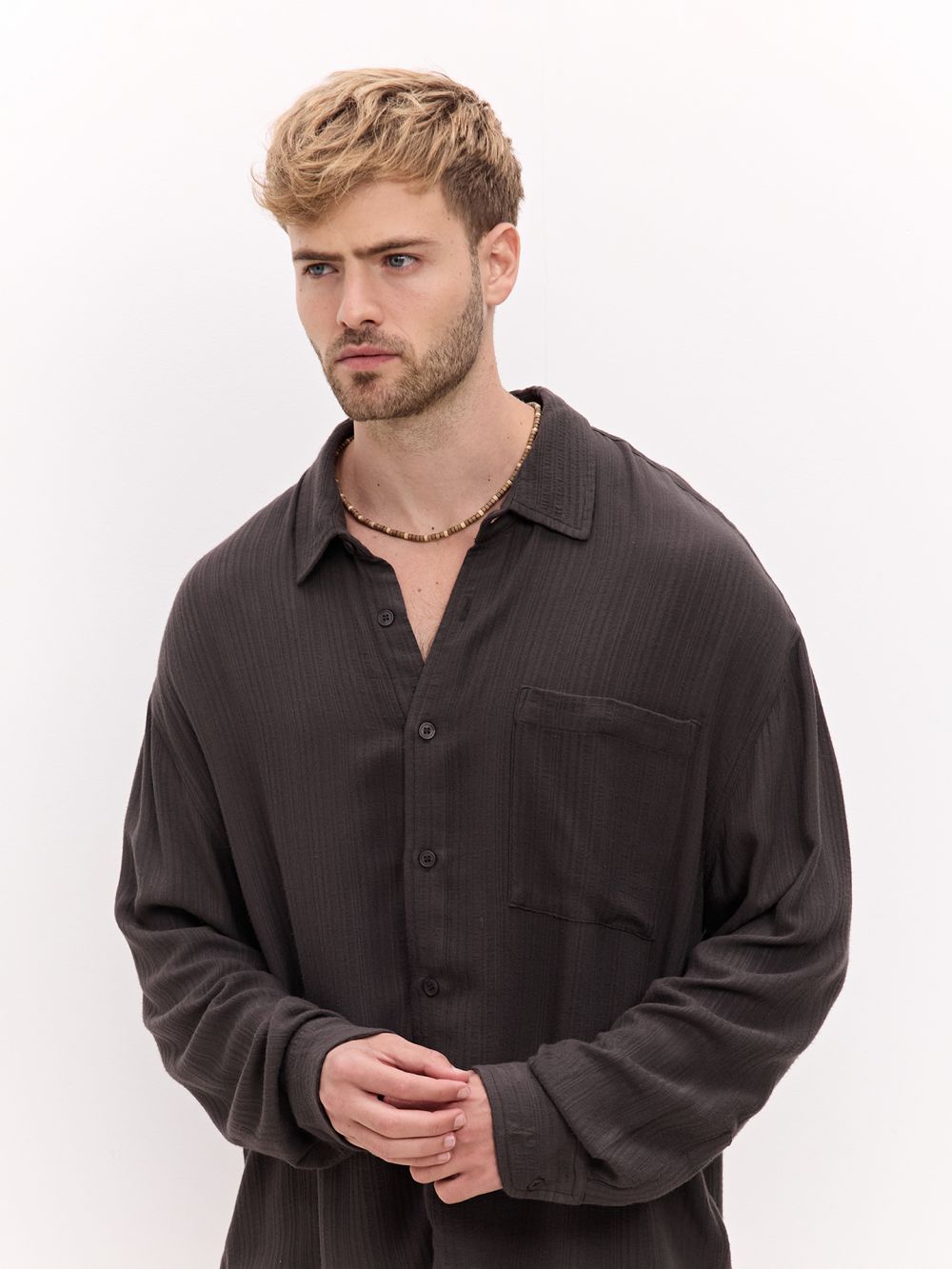 מכופתרת מבד רקום