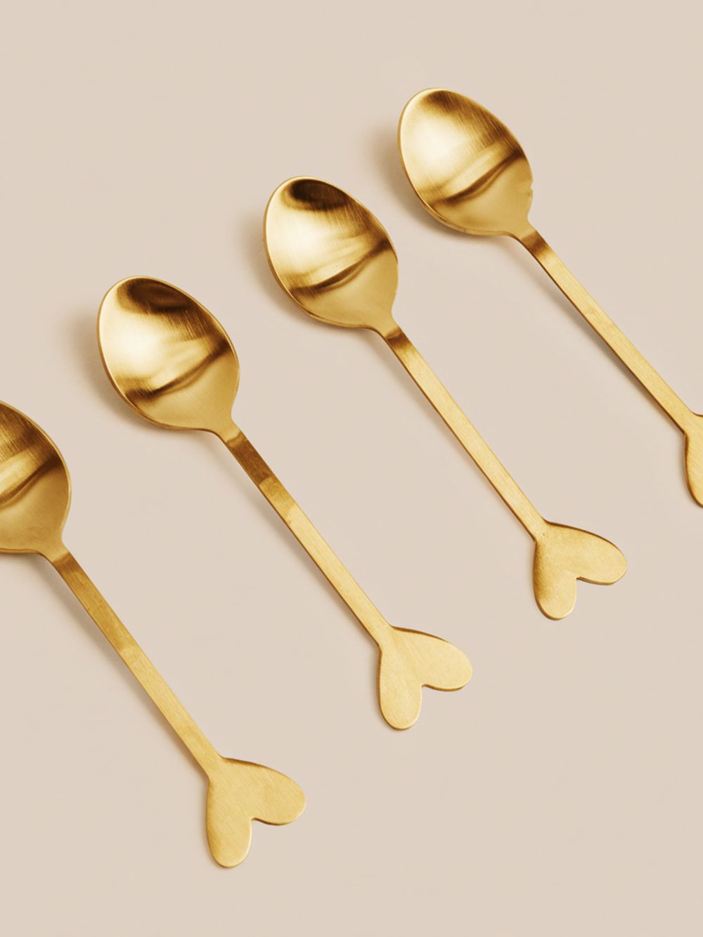 סט 4 כפיות מוזהבות לב