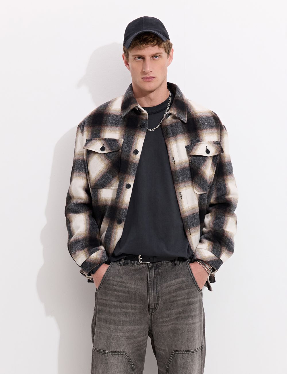 ז׳קט משבצות עם כיסים קדמיים