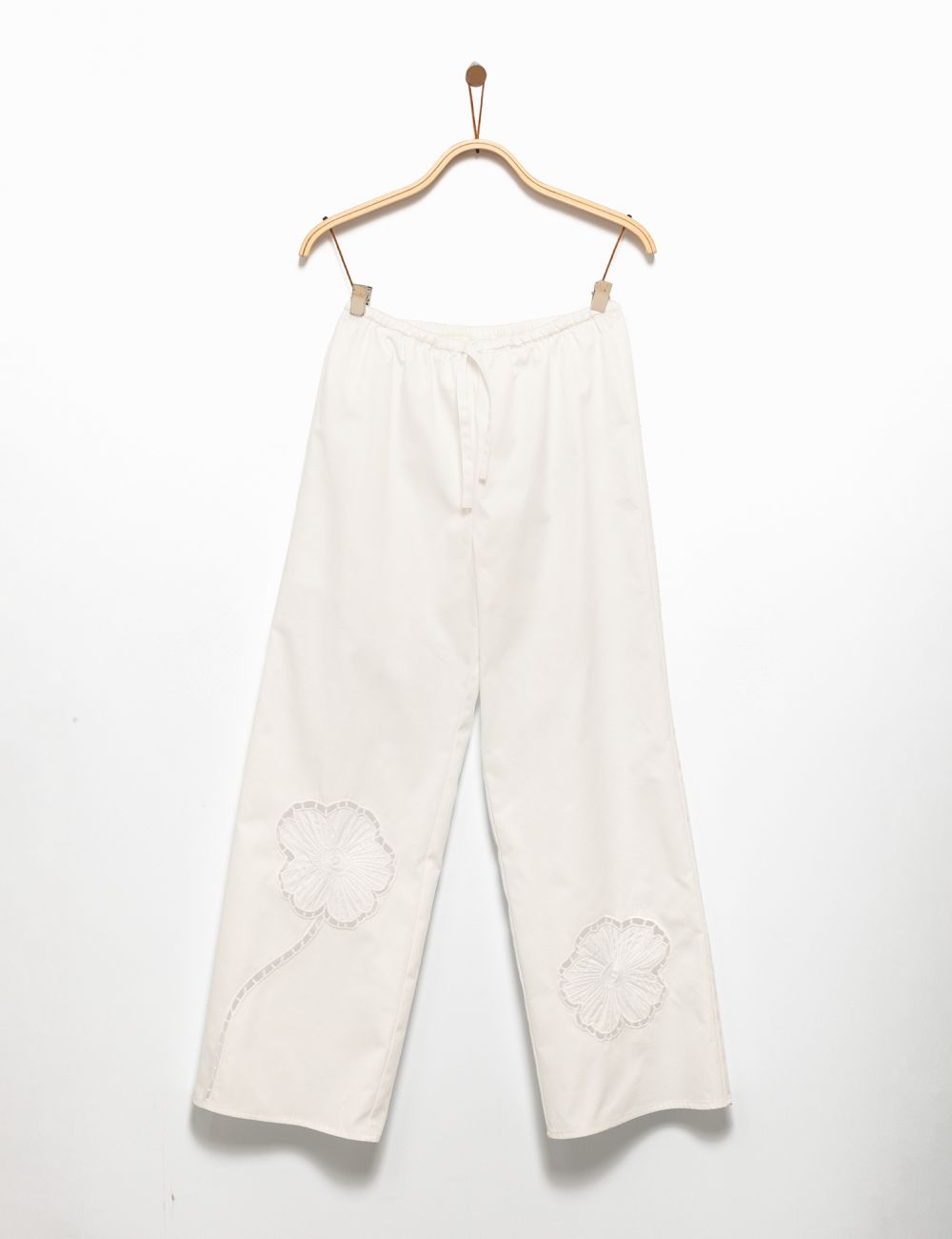 מכנסי אריג רקומים