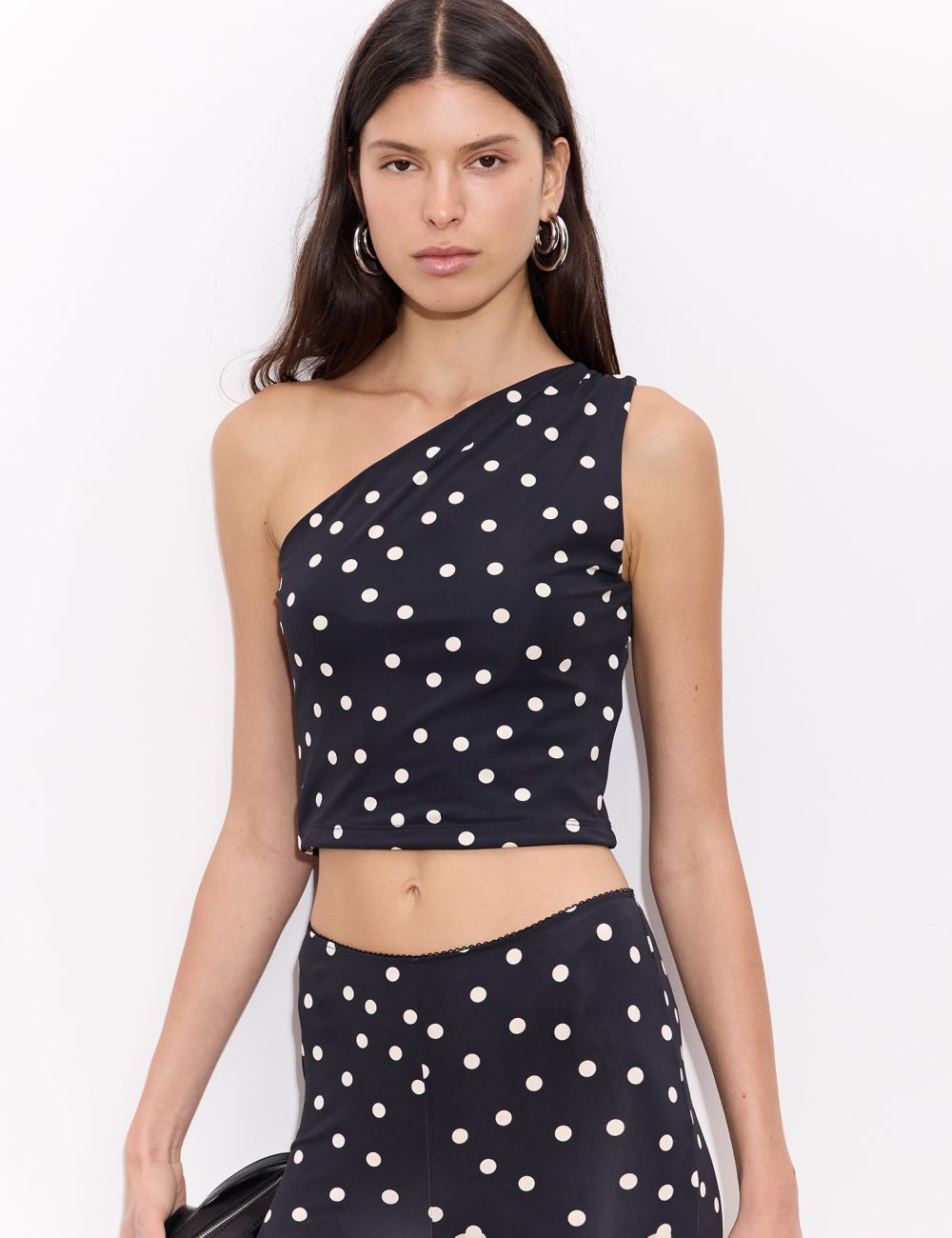 טופ אסימטרי מנוקד