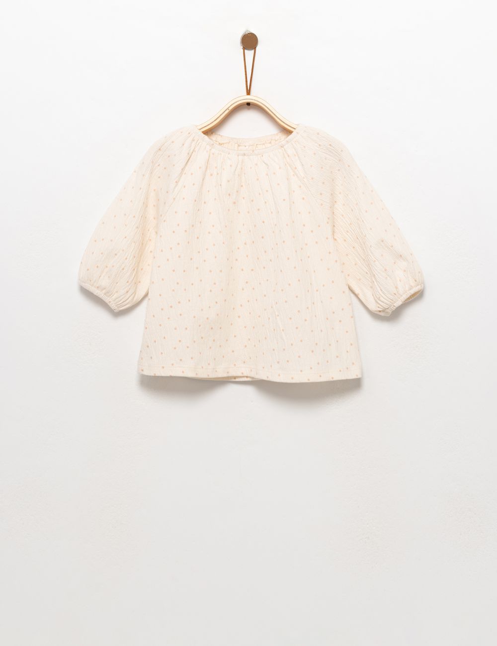 חולצה עם כיווצים