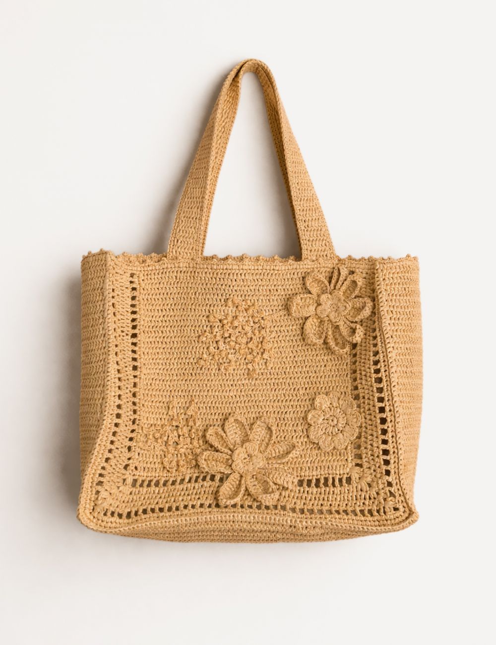 תיק קש בסריגת פרחים