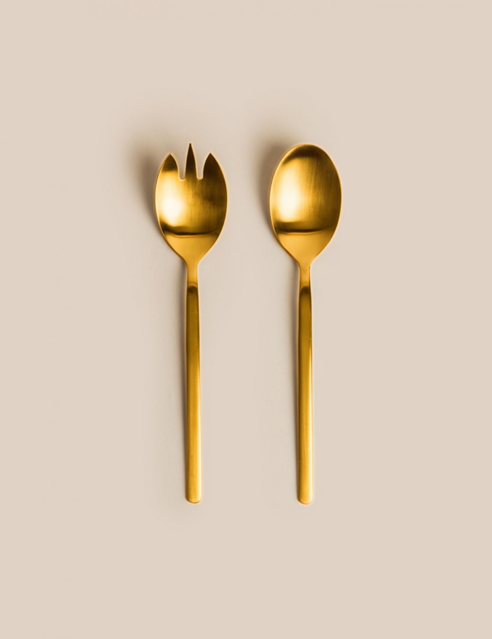 כפות הגשה מוזהבות דניאל